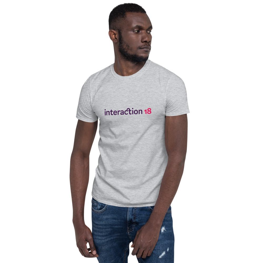 Man in sport grey T-shirt with purple and magenta Interaction 18 logo across the chest