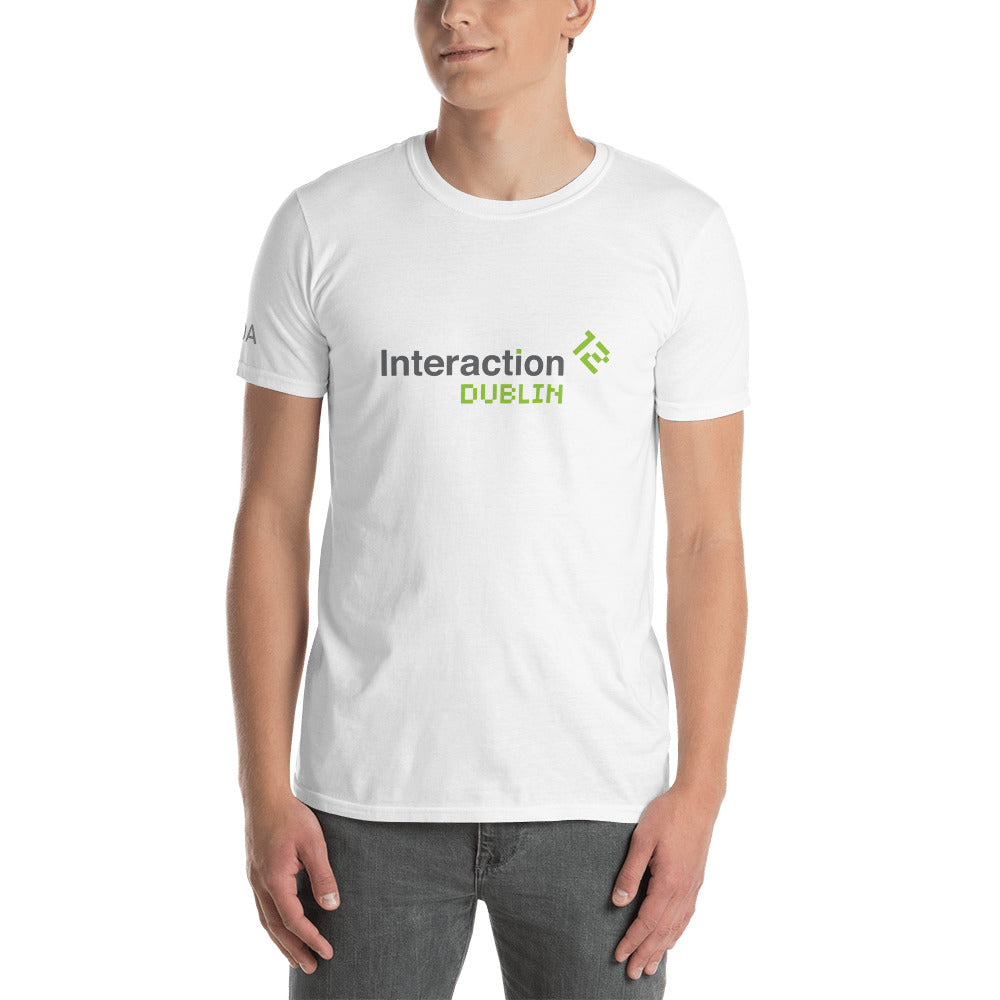 Man in white T-shirt with grey and  green Interaction 12 logo on the front